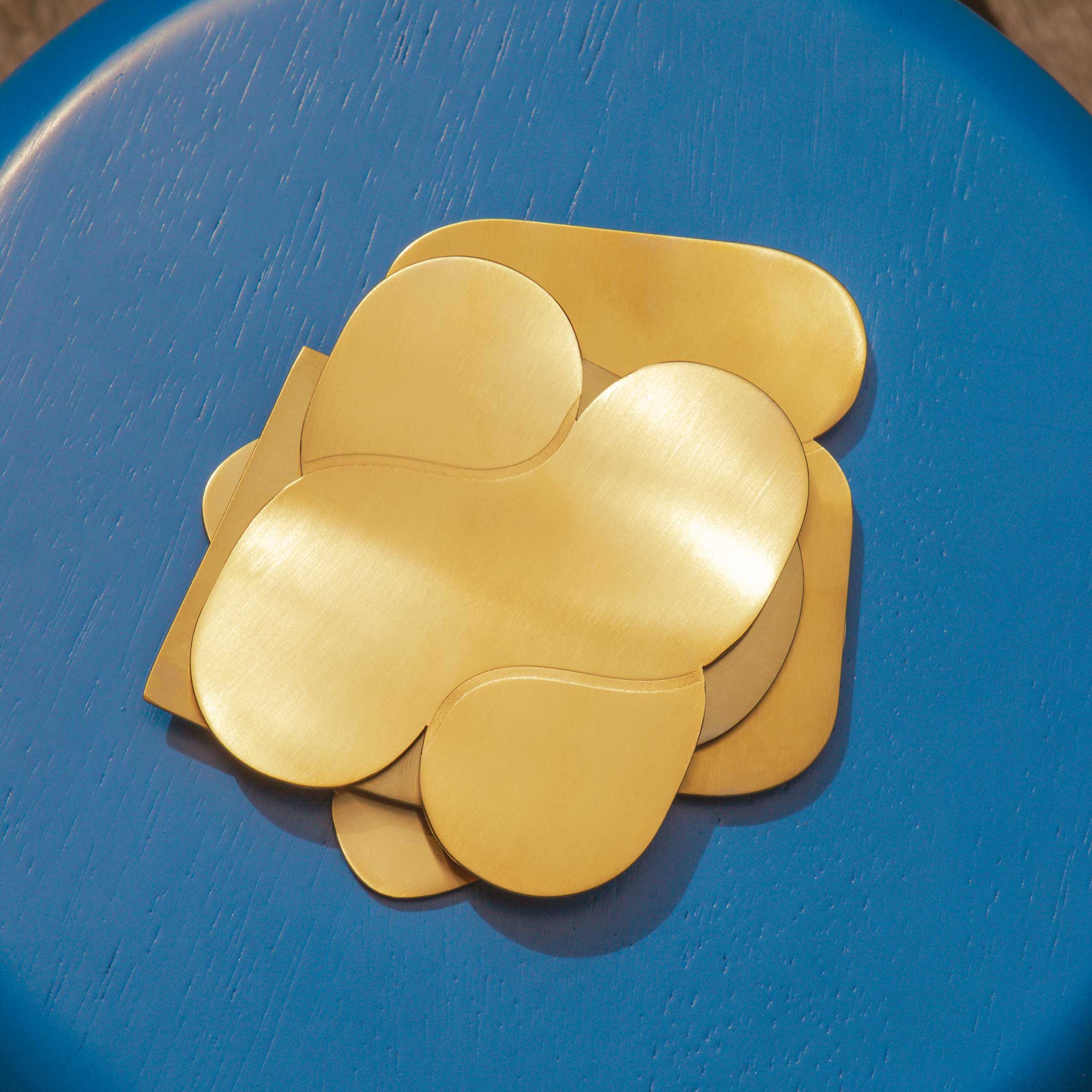TOGETHER COASTERS | Set of 4 Coasters | Stainless steel brass-colored | Dan Covert | Areaware