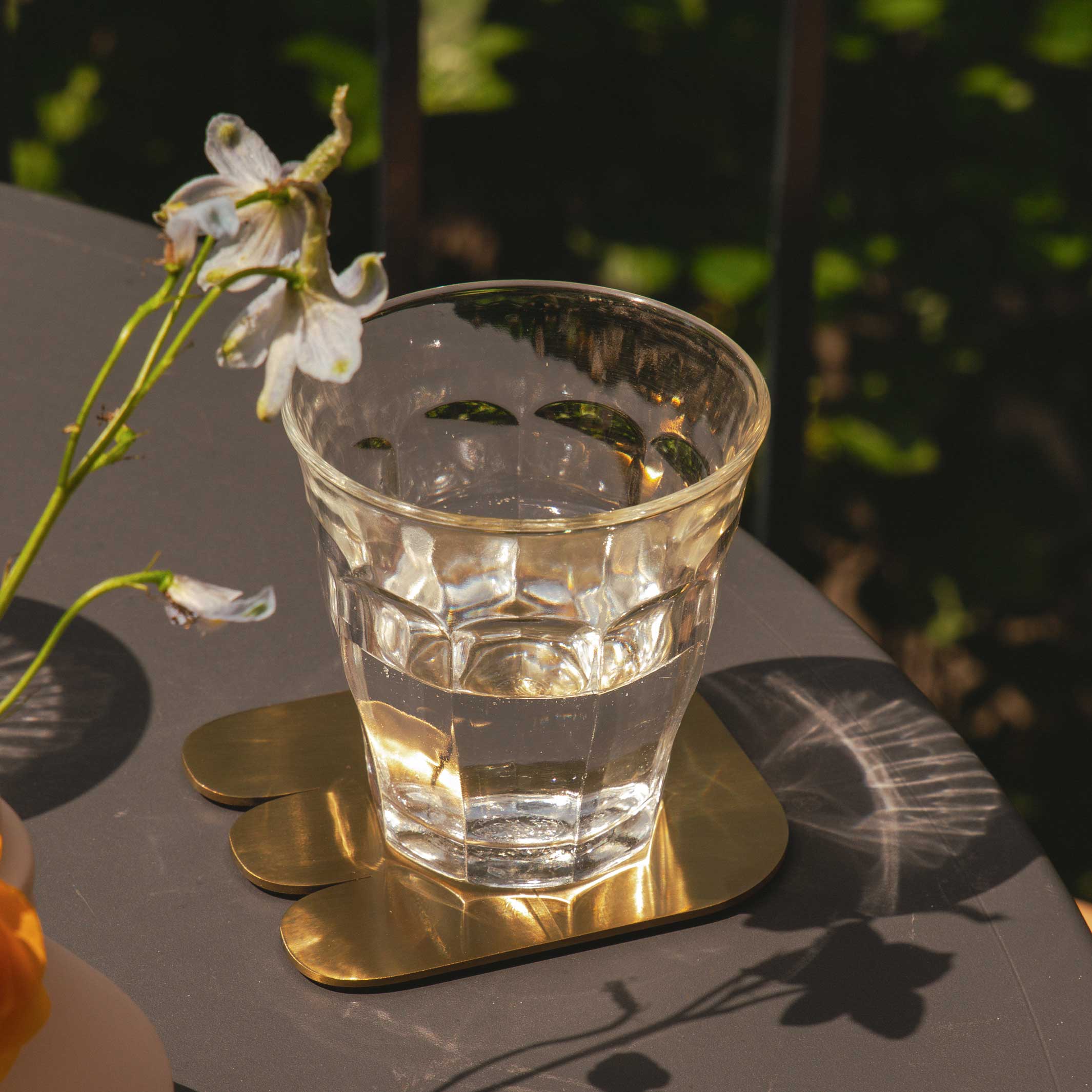 TOGETHER COASTERS | Set of 4 Coasters | Stainless steel brass-colored | Dan Covert | Areaware