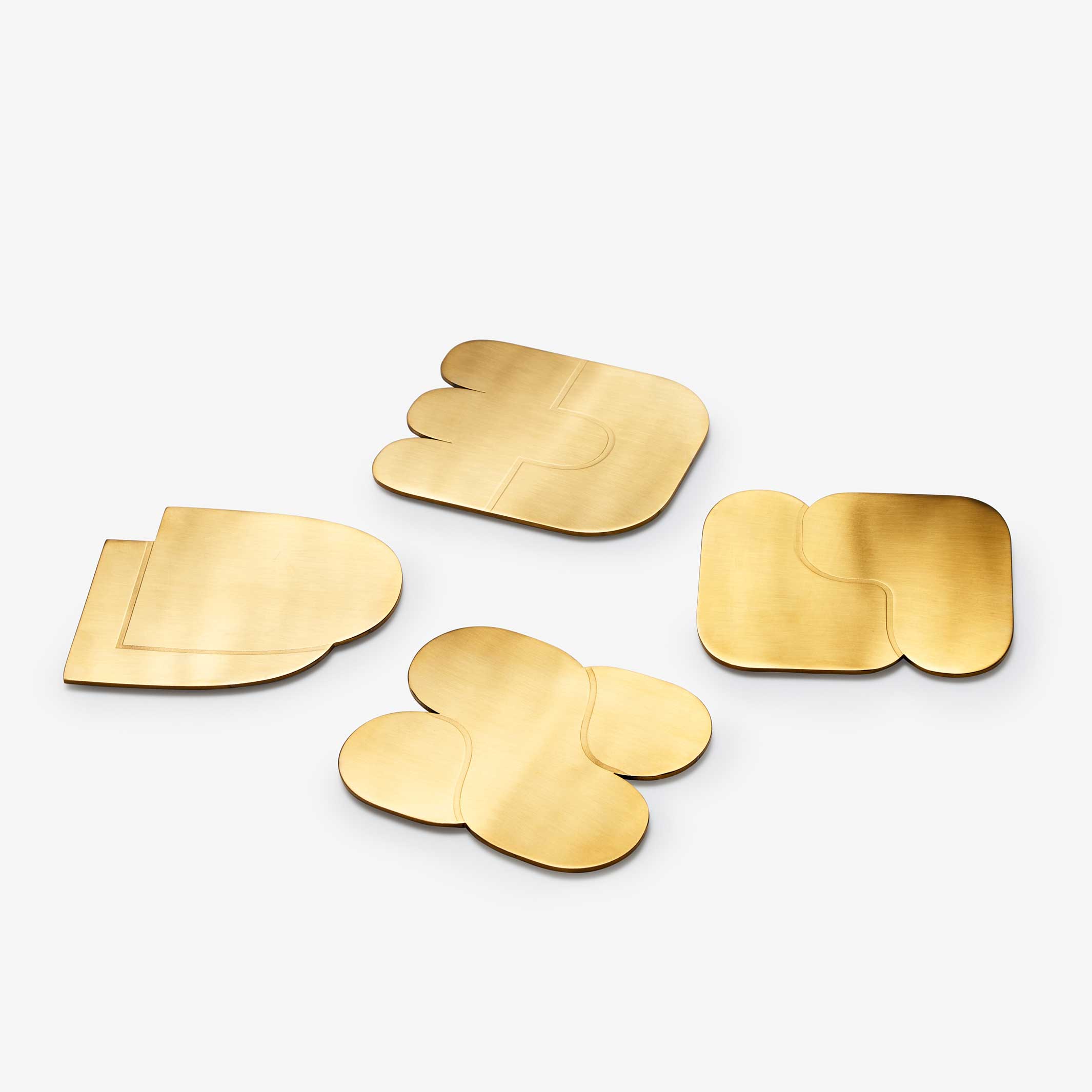 TOGETHER COASTERS | Set of 4 Coasters | Stainless steel brass-colored | Dan Covert | Areaware