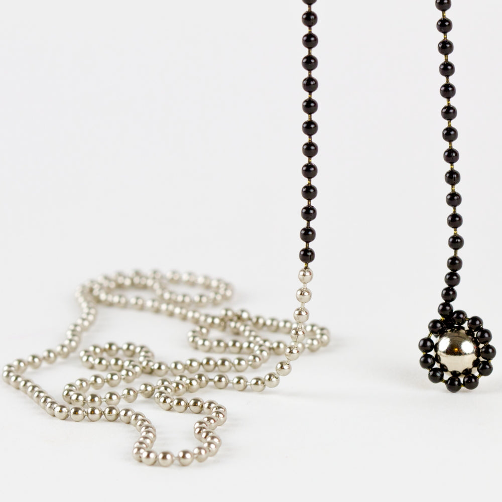 UNO - Interactiver MAGNETSCHMUCK (Zweifarbig) von Luis Pons - Charles & Marie