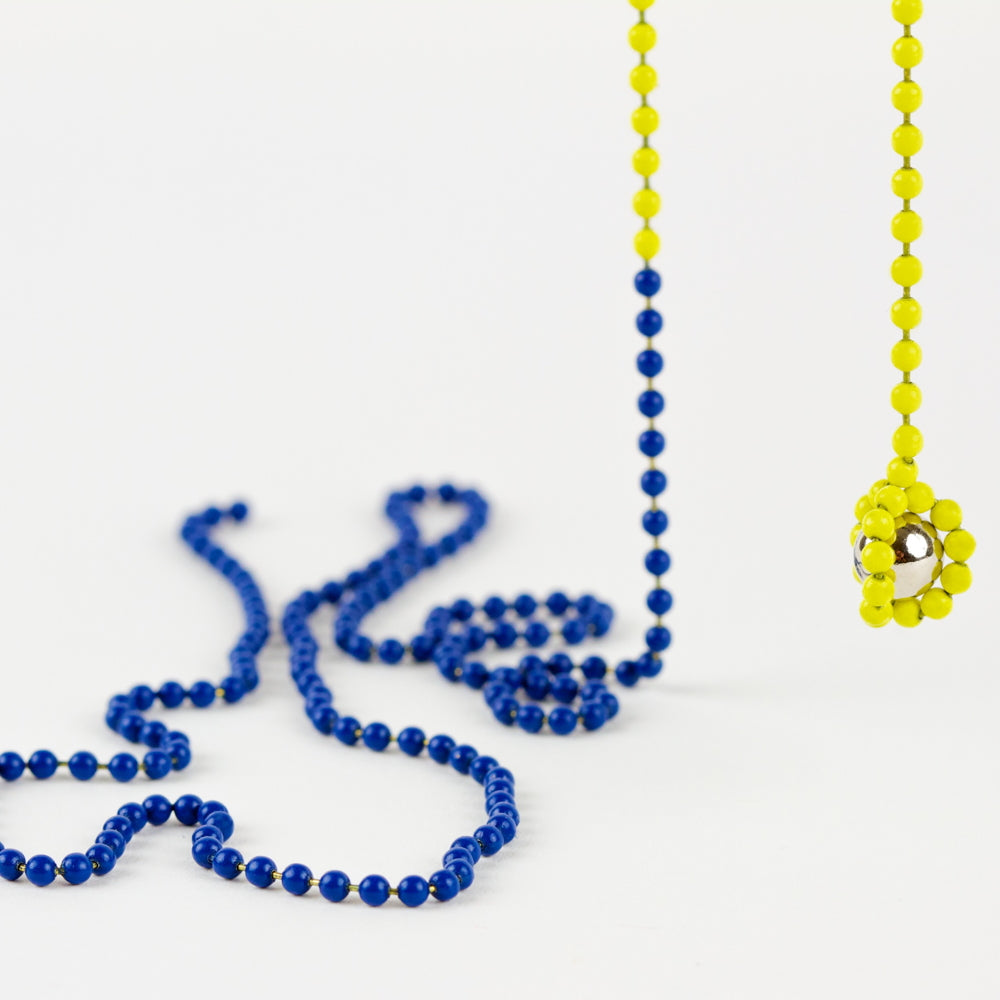 UNO - Interactiver MAGNETSCHMUCK (Zweifarbig) von Luis Pons - Charles & Marie