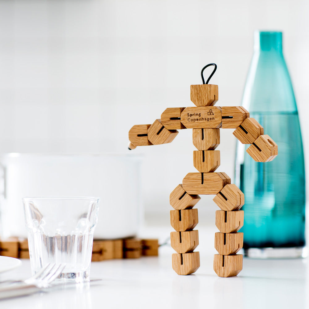 Small CLUMSY HANS | Petit dessous de verre en POT | Figurine en bois 3D | Nis Hauge | Spring Copenhagen