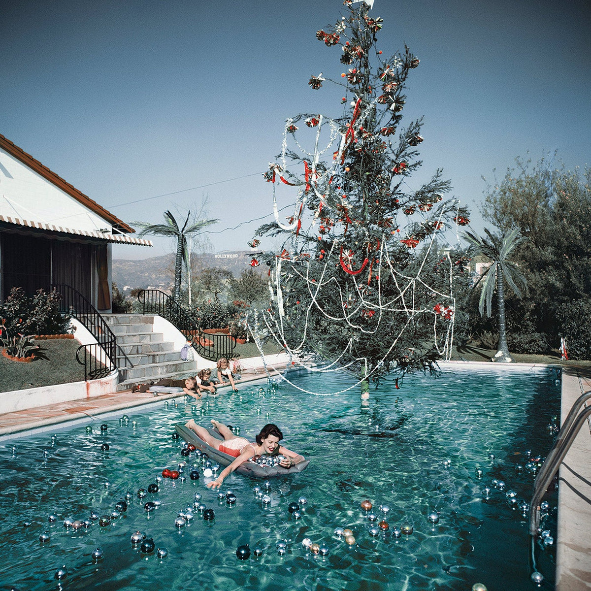Slim-Aarons-Puzzle "Christmas Swim" – 1000 Teile | Piecework